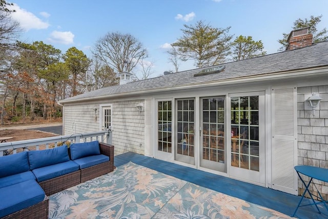 wooden terrace featuring outdoor lounge area