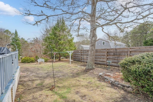 view of yard featuring fence