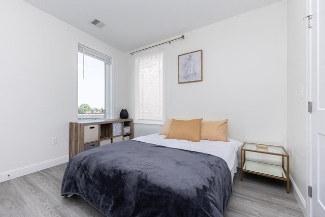 92-94 George St Unit 203, Boston, MA 02119 - bedroom featuring light wood-style floors
