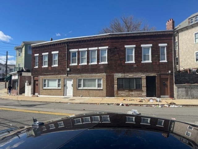 view of front of home with brick siding