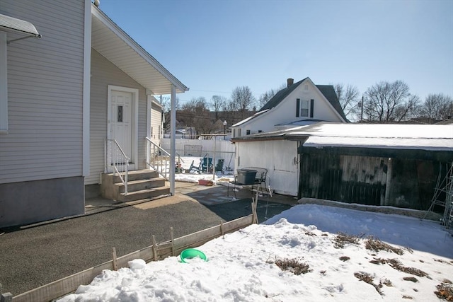 view of snow covered property