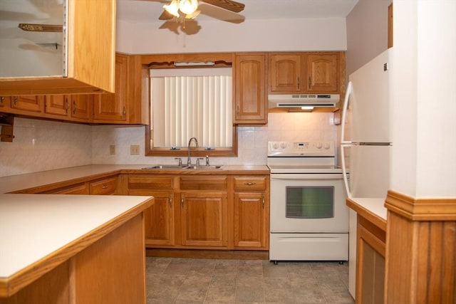 kitchen with ceiling fan, white electric range oven, sink, and backsplash