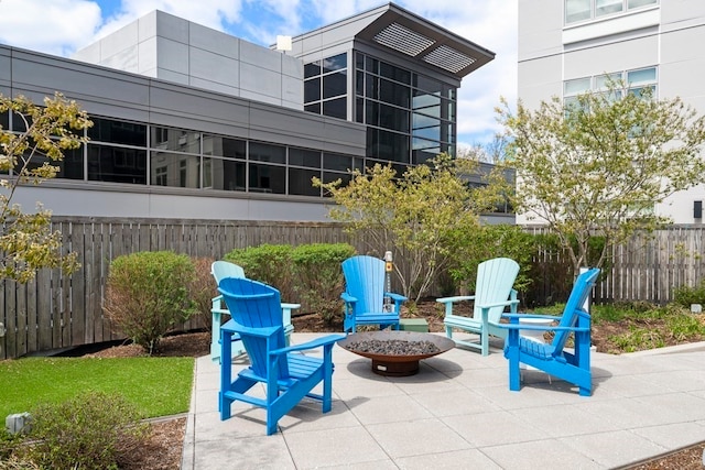 view of patio featuring an outdoor fire pit