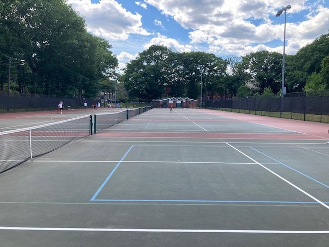 view of sport court with fence and community basketball court