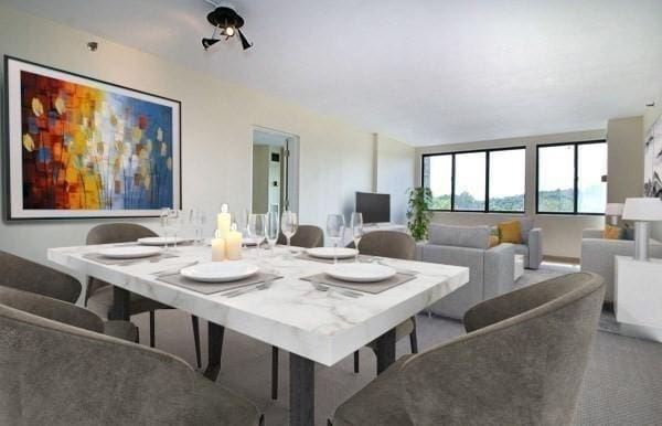 view of carpeted dining area