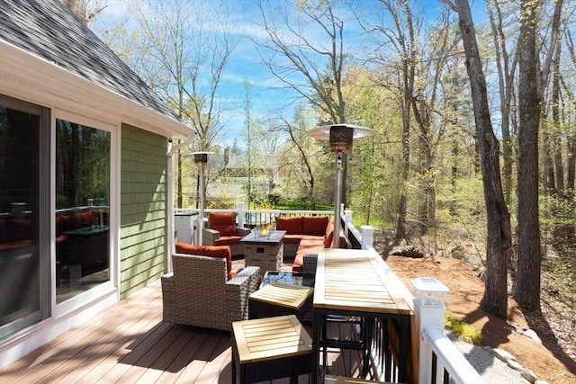 deck with an outdoor hangout area