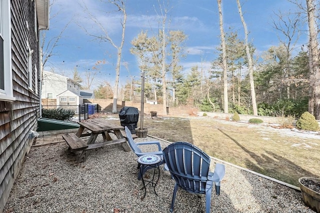 view of yard featuring a patio area and fence