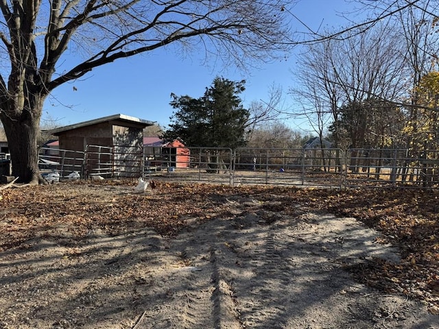 view of yard with an exterior structure and an outbuilding