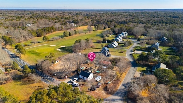 drone / aerial view featuring a forest view