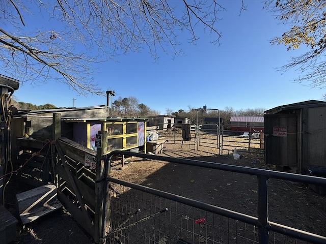 view of yard with an exterior structure and an outbuilding