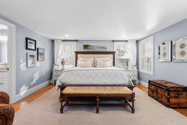 bedroom featuring light wood-type flooring