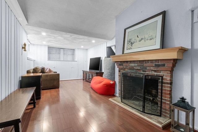 living room featuring hardwood / wood-style floors and a fireplace