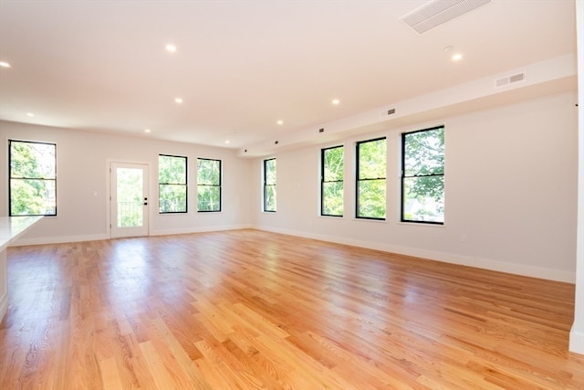 unfurnished room featuring light hardwood / wood-style flooring