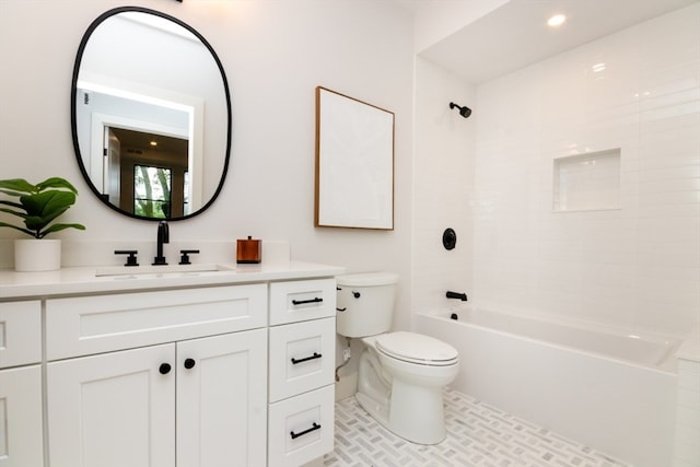 full bathroom with tile patterned floors, vanity, toilet, and tiled shower / bath