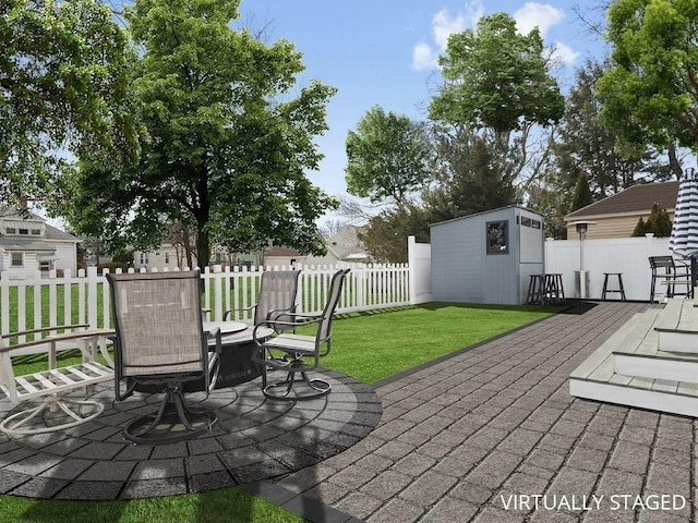 view of patio / terrace featuring a storage shed, an outdoor structure, and a fenced backyard