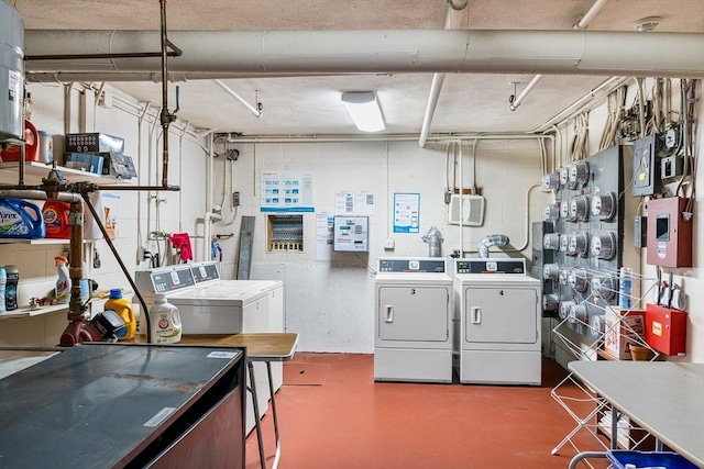 11 Cogswell Ave Unit 16, Cambridge, MA 02140 - community laundry with washing machine and dryer and concrete block wall