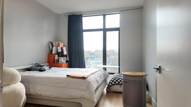 bedroom with light hardwood / wood-style floors