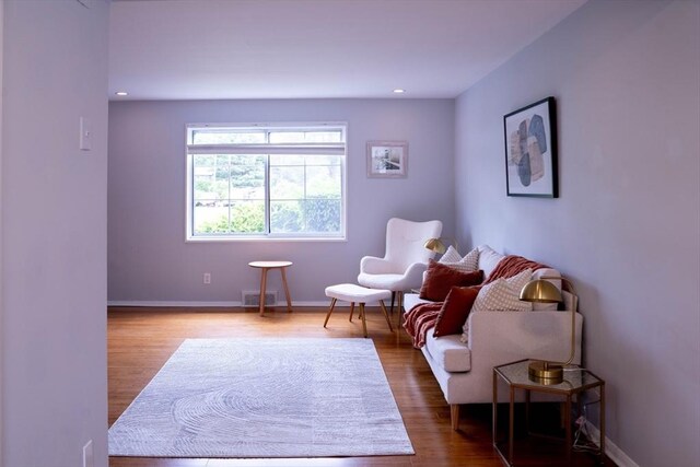 62 Roberts Dr Unit 62, Bedford, MA 01730 - sitting room with wood finished floors, baseboards, and recessed lighting