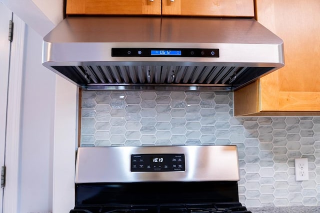 62 Roberts Dr Unit 62, Bedford, MA 01730 - kitchen view of exhaust hood, range, and decorative backsplash