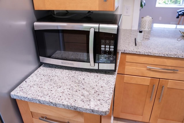 62 Roberts Dr Unit 62, Bedford, MA 01730 - kitchen with stainless steel microwave and light stone countertops