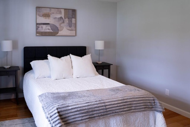 62 Roberts Dr Unit 62, Bedford, MA 01730 - bedroom featuring wood finished floors and baseboards