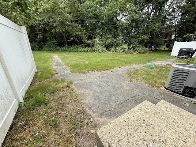 62 Roberts Dr Unit 62, Bedford, MA 01730 - view of green lawn with central AC unit