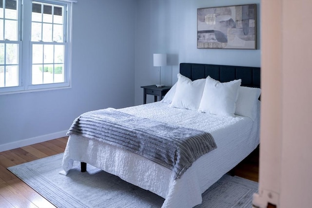 62 Roberts Dr Unit 62, Bedford, MA 01730 - bedroom featuring wood finished floors and baseboards