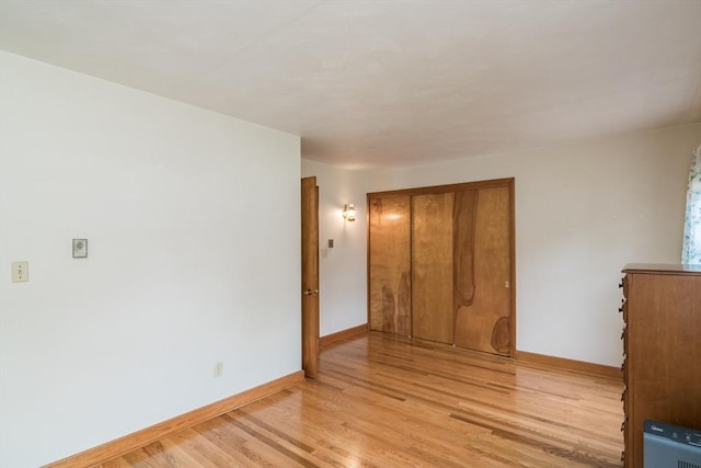 5 Norman Cir, Montague, MA 01376 - empty room with light wood-style floors and baseboards