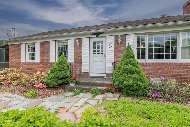 5 Norman Cir, Montague, MA 01376 - property entrance with brick siding