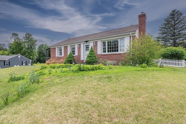 5 Norman Cir, Montague, MA 01376 - single story home featuring brick siding and a chimney