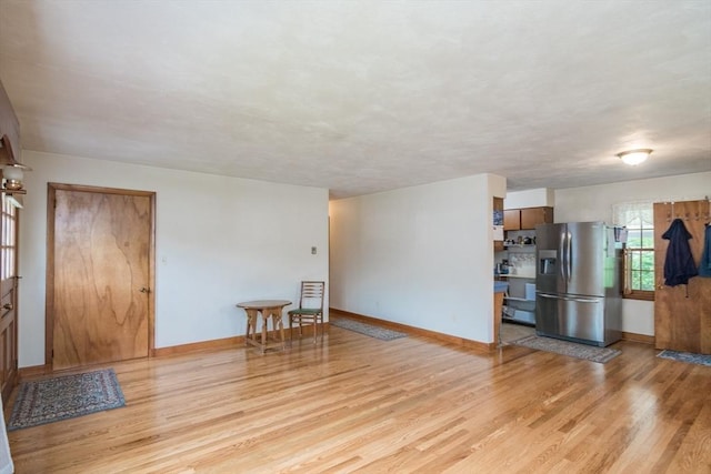 5 Norman Cir, Montague, MA 01376 - living area featuring light wood-style flooring and baseboards
