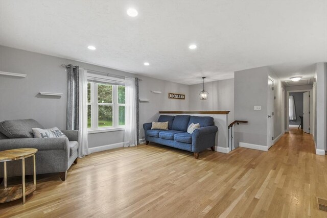 74 S Douglas St, Rockland, MA 02370 - living area with light wood-type flooring and recessed lighting