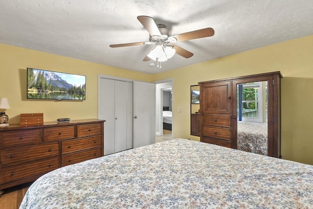 74 S Douglas St, Rockland, MA 02370 - bedroom with a ceiling fan, a textured ceiling, and a closet