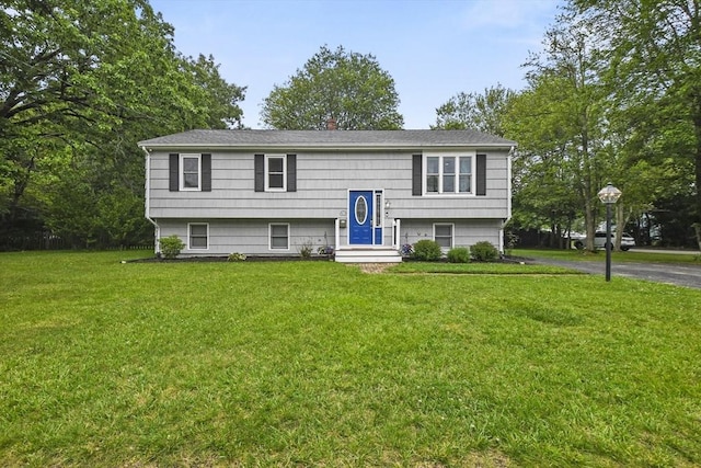 74 S Douglas St, Rockland, MA 02370 - bi-level home with a front lawn