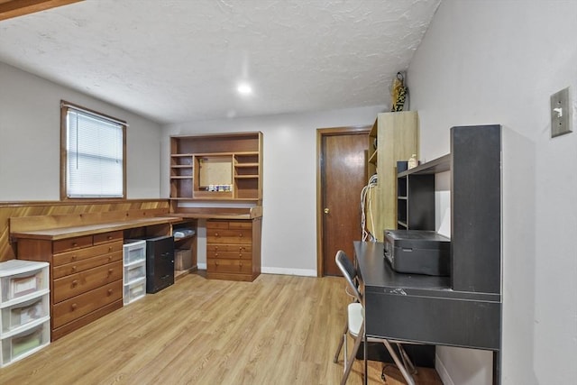 74 S Douglas St, Rockland, MA 02370 - office featuring light wood-type flooring, a textured ceiling, and built in study area