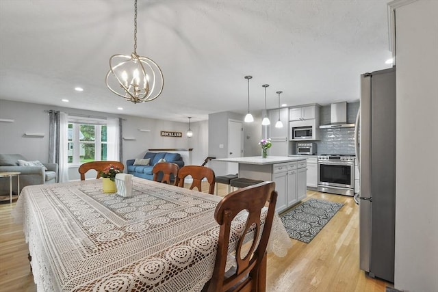 74 S Douglas St, Rockland, MA 02370 - dining room featuring light wood-style flooring, a chandelier, and recessed lighting