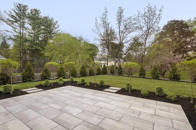 view of patio featuring fence