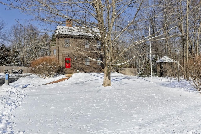 view of yard covered in snow