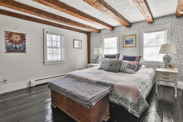 bedroom featuring beam ceiling, dark hardwood / wood-style flooring, multiple windows, and a baseboard radiator