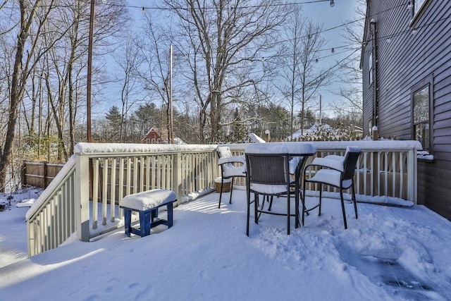 view of snow covered deck