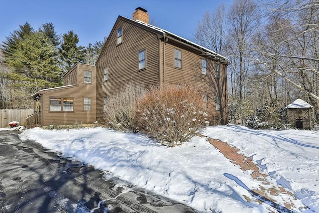 view of snow covered property