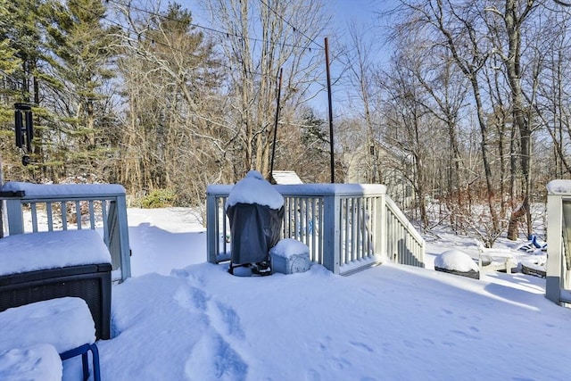 view of snow covered deck