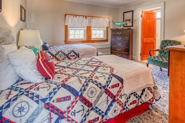 bedroom with crown molding