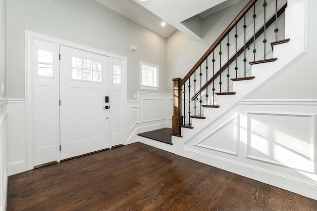 foyer entrance featuring dark hardwood / wood-style flooring