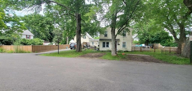 view of front of home with fence