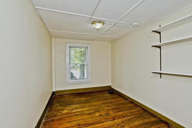 734 Main St, Amherst, MA 01002 - spare room with dark wood-type flooring and baseboards