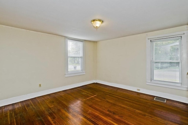 734 Main St, Amherst, MA 01002 - unfurnished room with dark wood-type flooring and baseboards