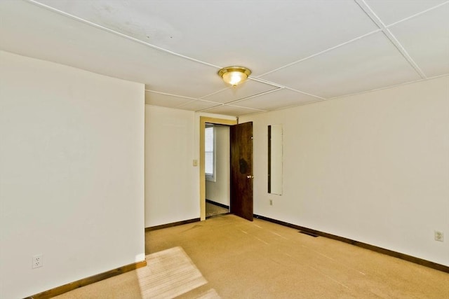 734 Main St, Amherst, MA 01002 - spare room with baseboards and light carpet