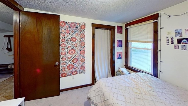 734 Main St, Amherst, MA 01002 - bedroom featuring a textured ceiling and carpet
