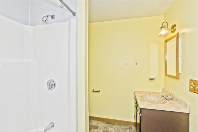 734 Main St, Amherst, MA 01002 - full bathroom with vanity, a shower, and baseboards